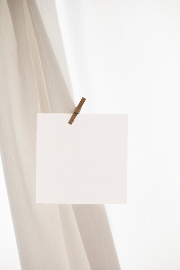 Mastering the First Impression: Your intriguing post title goes here Simple blank card clipped to fabric, ideal for mockup designs with ample copy space.